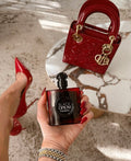 YSL black opium EDP over red